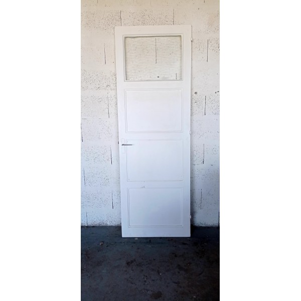 Porte a panneaux vitrée...